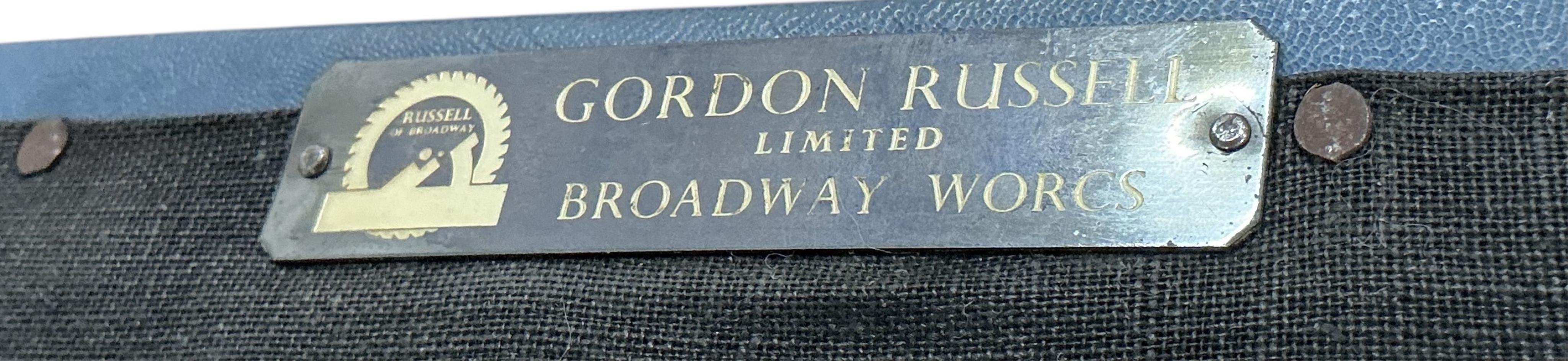 A set of four Gordon Russell mid century teak dining chairs, width 46cm, depth 44cm, height 85cm